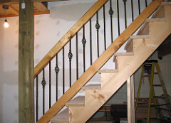 Basement stair rail