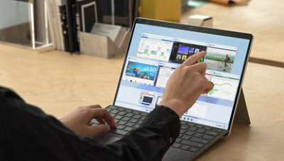 A person using a Surface Pro X