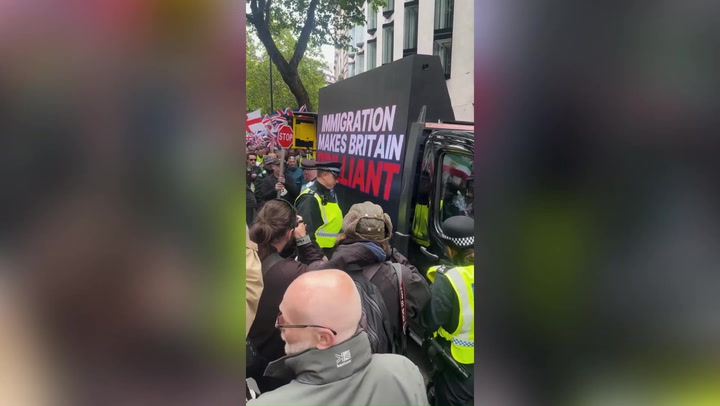 Huge pro-immigration display snuck into Tommy Robinson rally