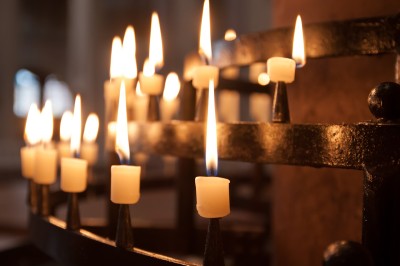 Light of candles into a church